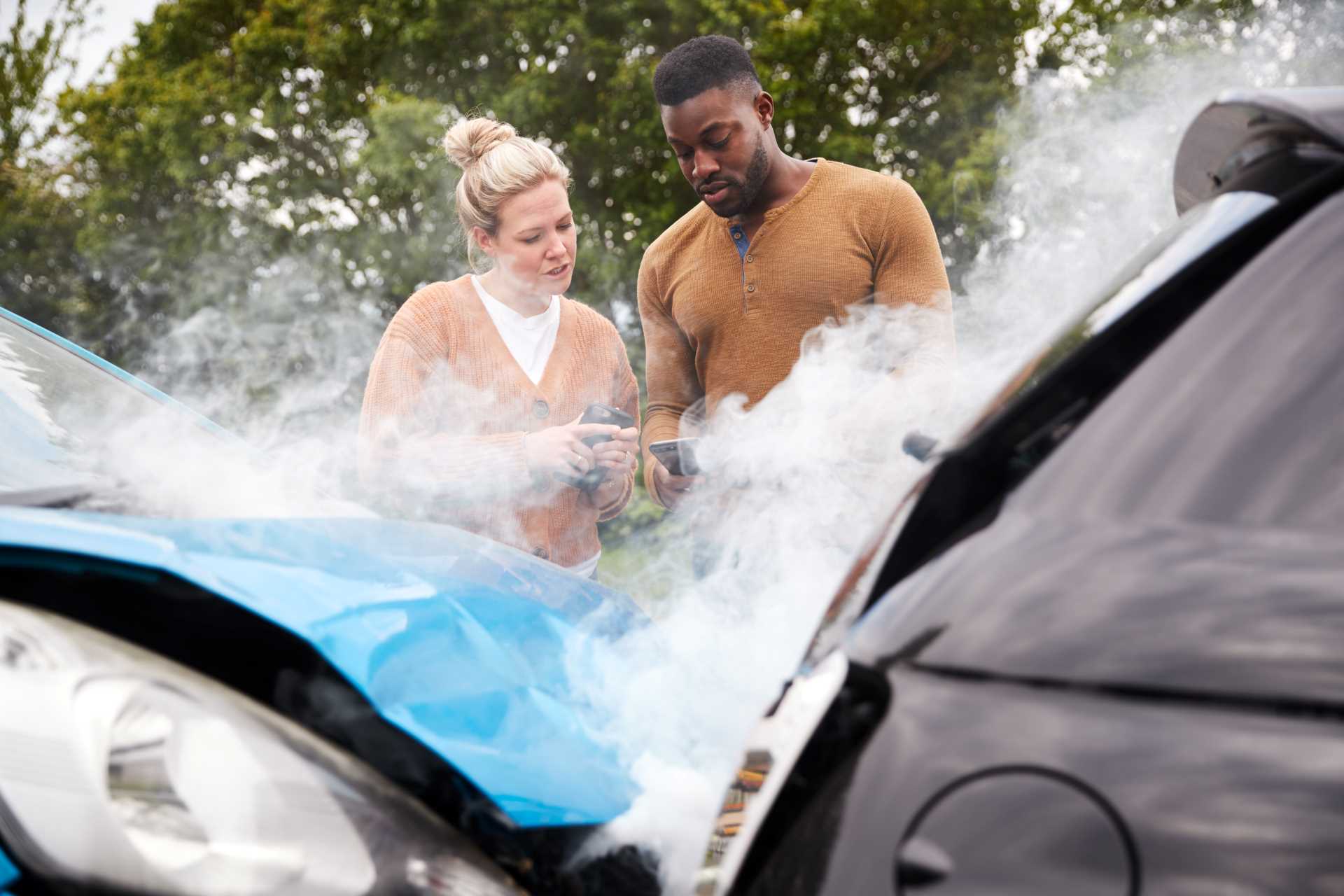 two motorists swapping insurance details on mobile 2023 11 27 05 15 54 utc c 1